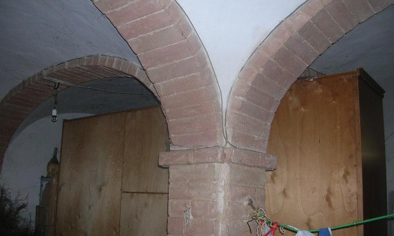 incredible arches on the ground floor - presently a cellar